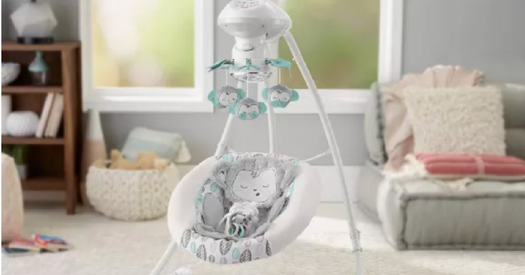 grey and white baby swing 