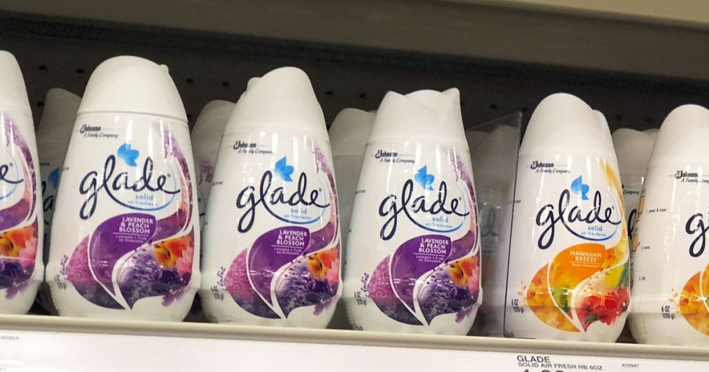 shelf of glade solid air fresheners in lavender and tropical scents at target