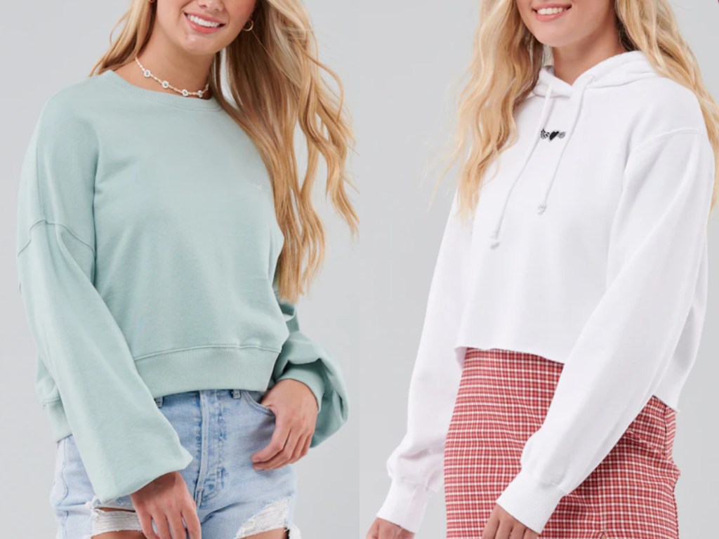 2 teen girls wearing hollister crop sweatshirts