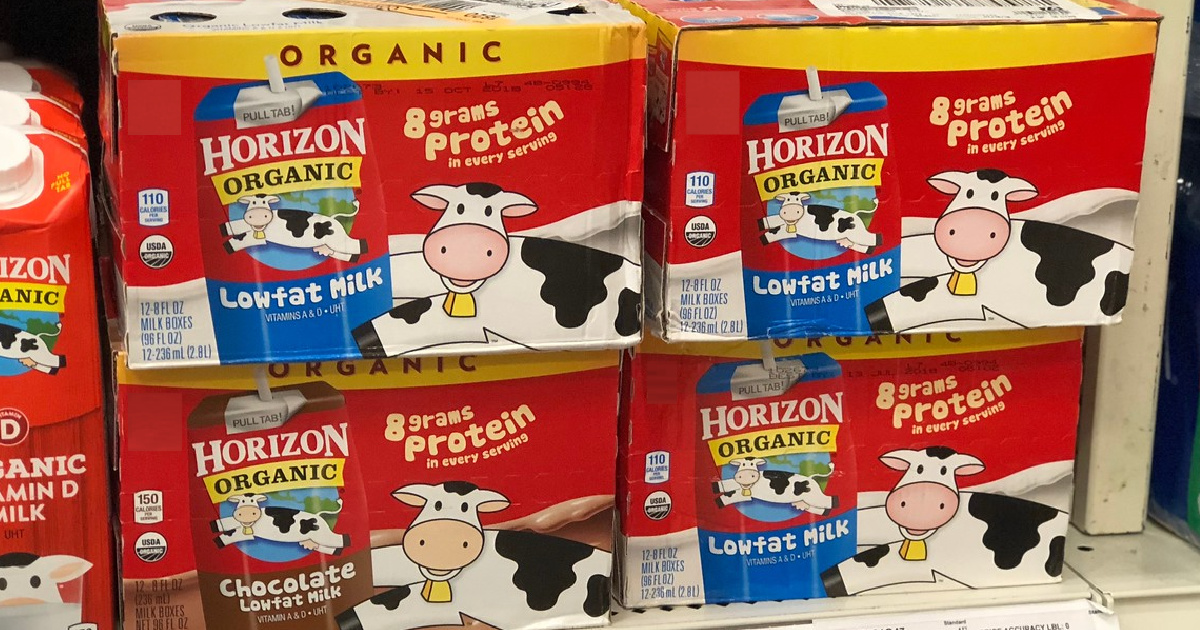 packs of milk cartons on store shelf