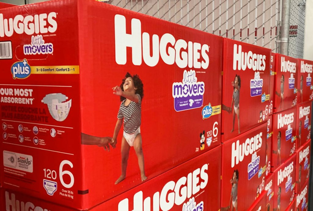 red boxes of huggies little movers diapers stacked on top of one another