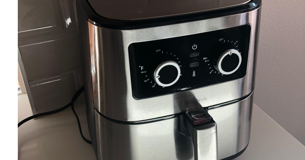 Insignia air fryer in stainless steel finish on counter top