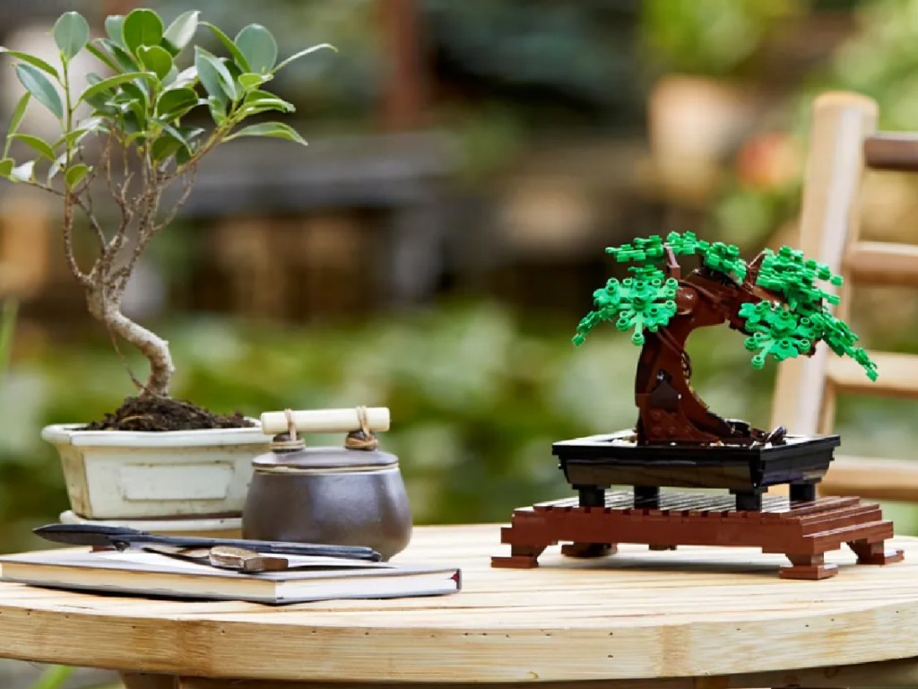 lego creator bonsai tree sitting on a table outside