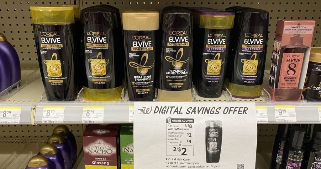 L'Oreal Elvive Shampoo and Conditioner on shelf w/ sign
