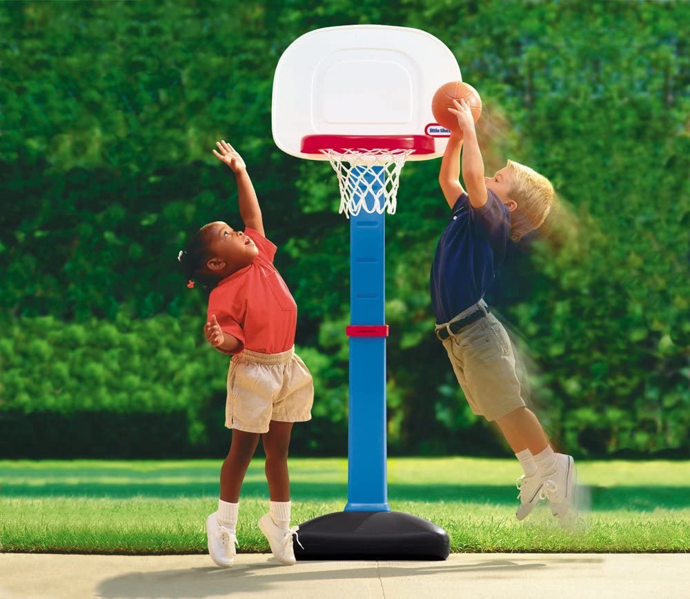 two kids playing basketball
