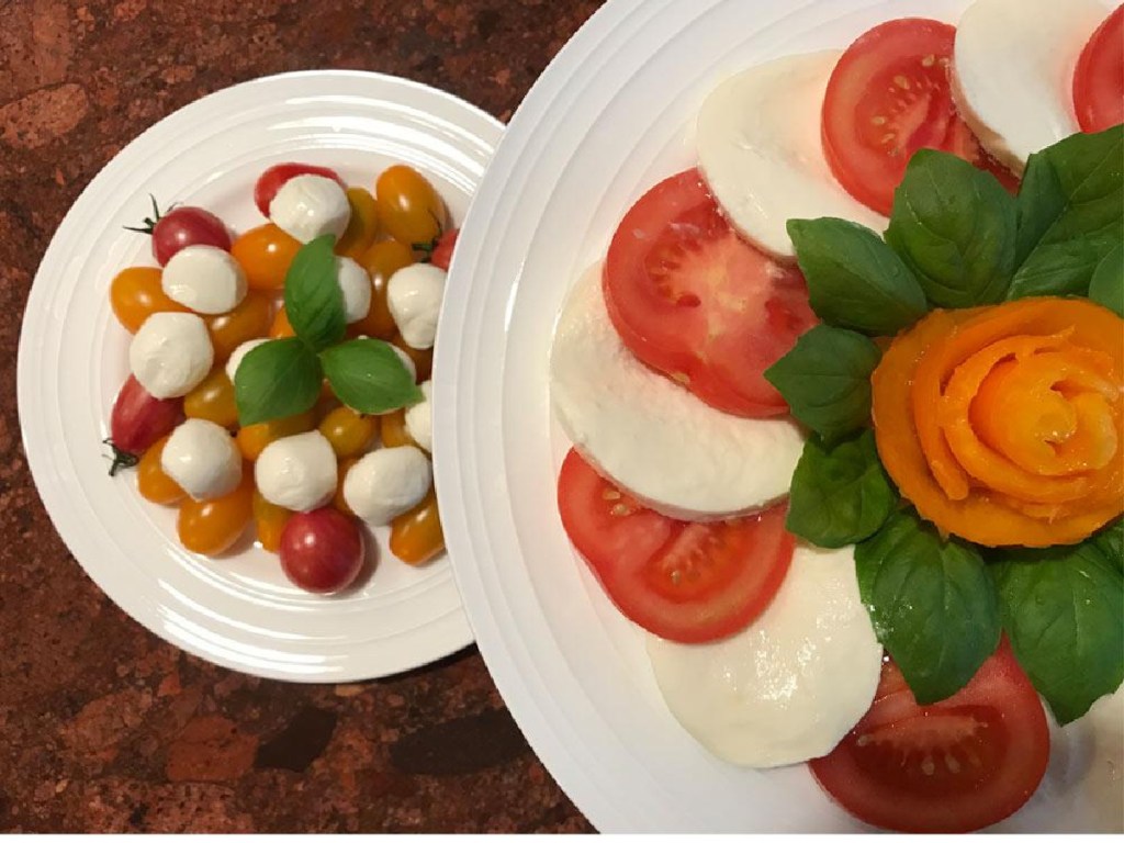 Mikasa Swirl Dinner plates with tomato and mozzarella on them