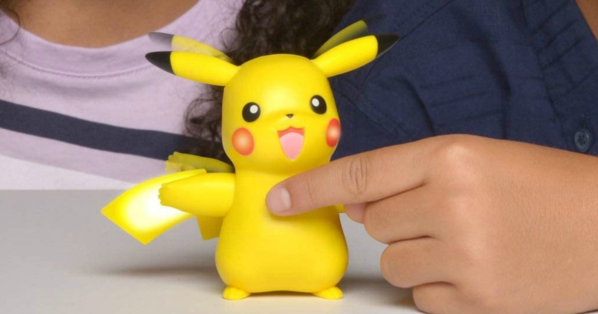 Kids playing with a Pikachu toy
