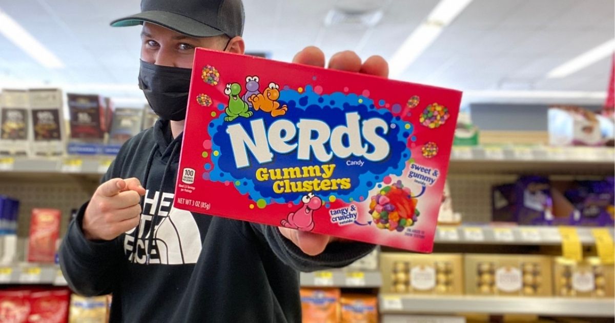 man holding Nerds Gummy Clusters Candy