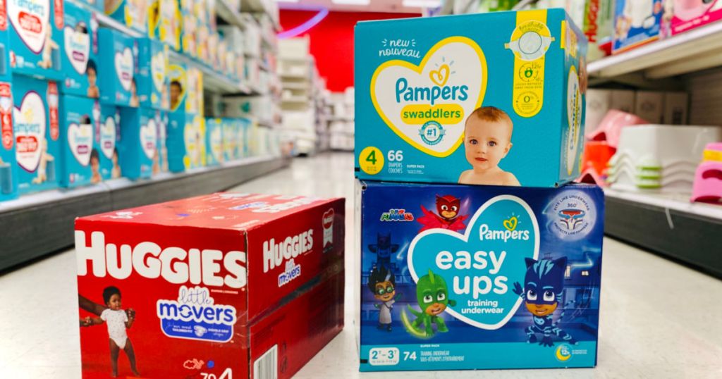 three boxes of diapers in aisle