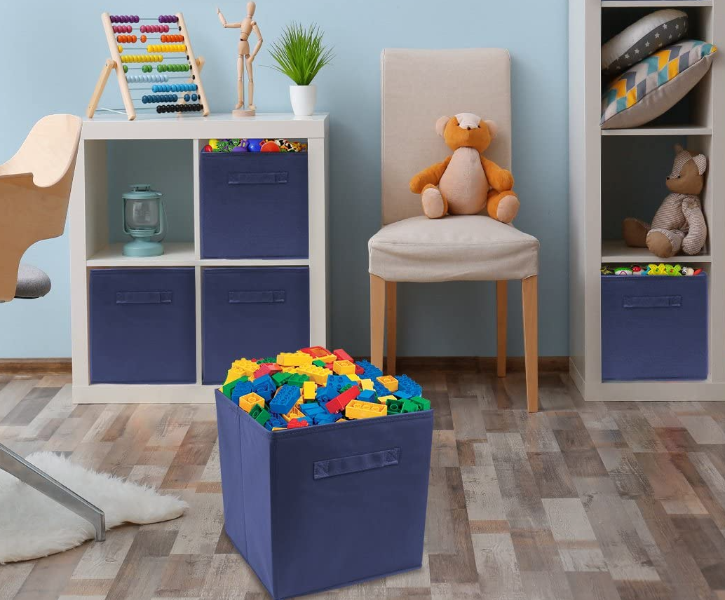 kids room with storage bins filled with toys