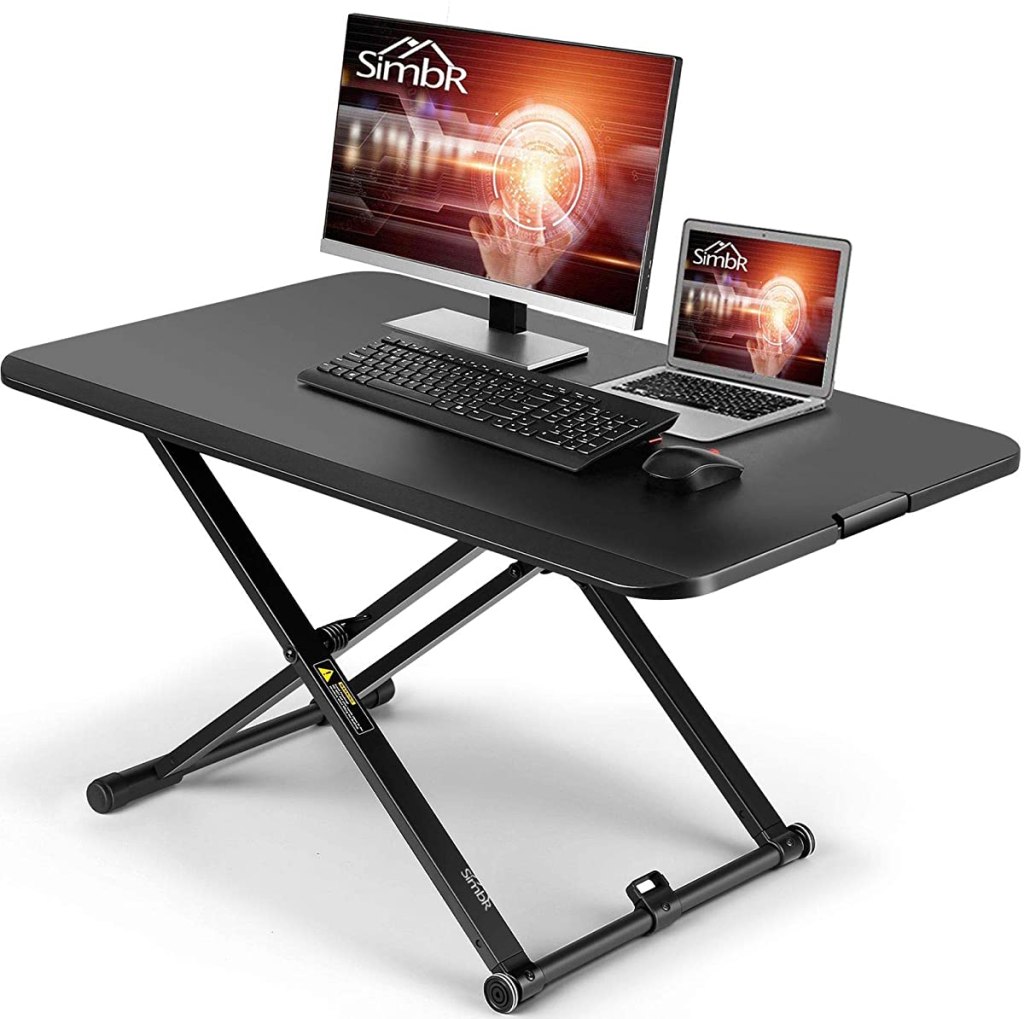 Standing Desk Converter with a laptop on it