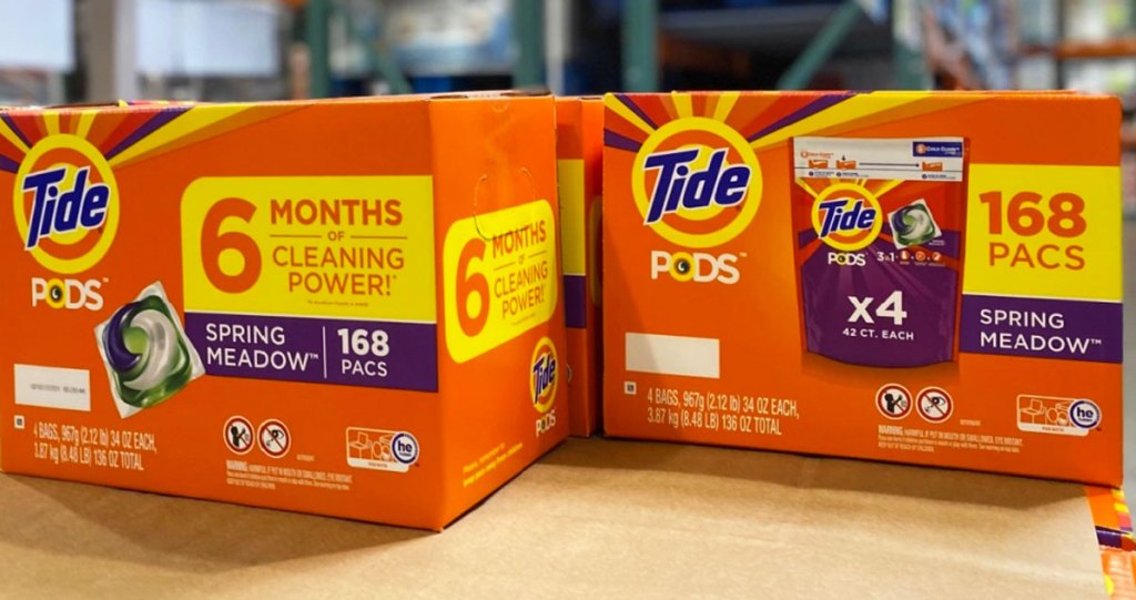 large orange boxes of tide pods in spring meadow scent