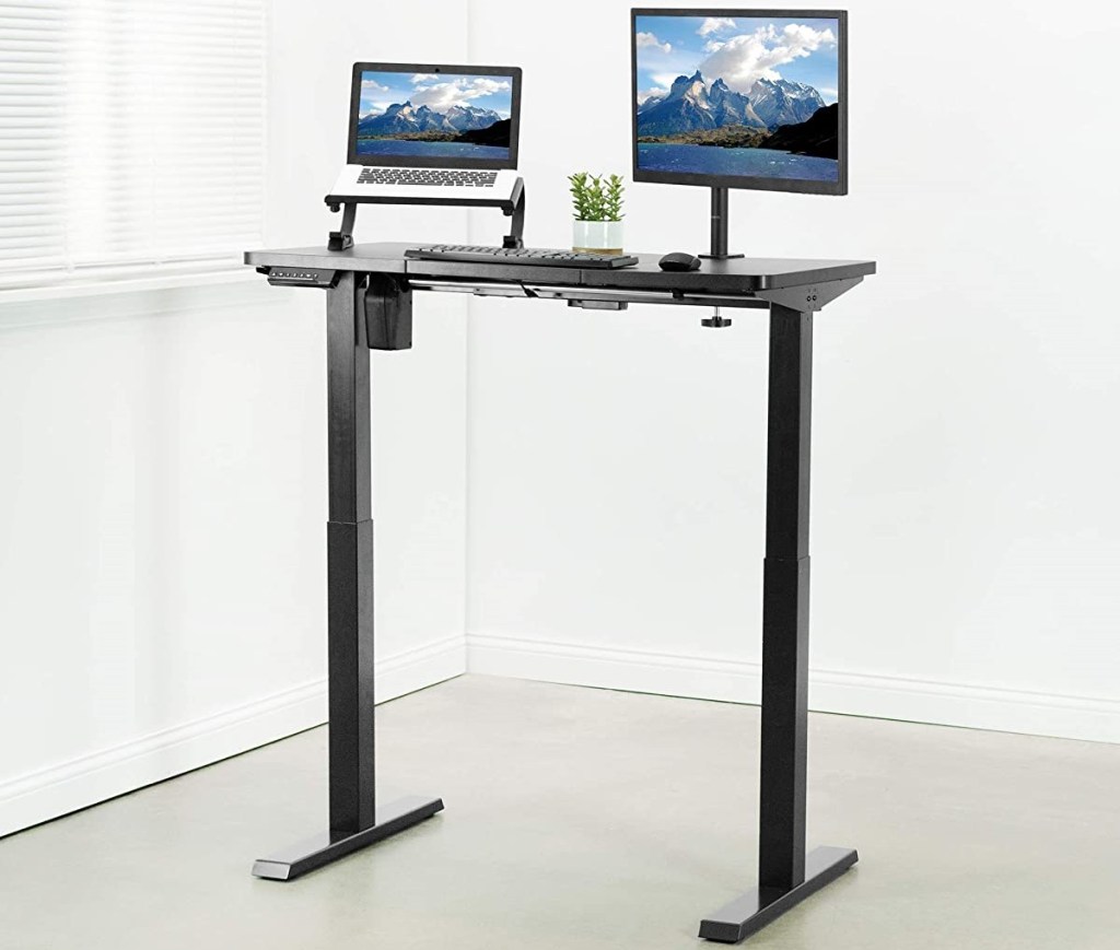 standing desk with a computer on it
