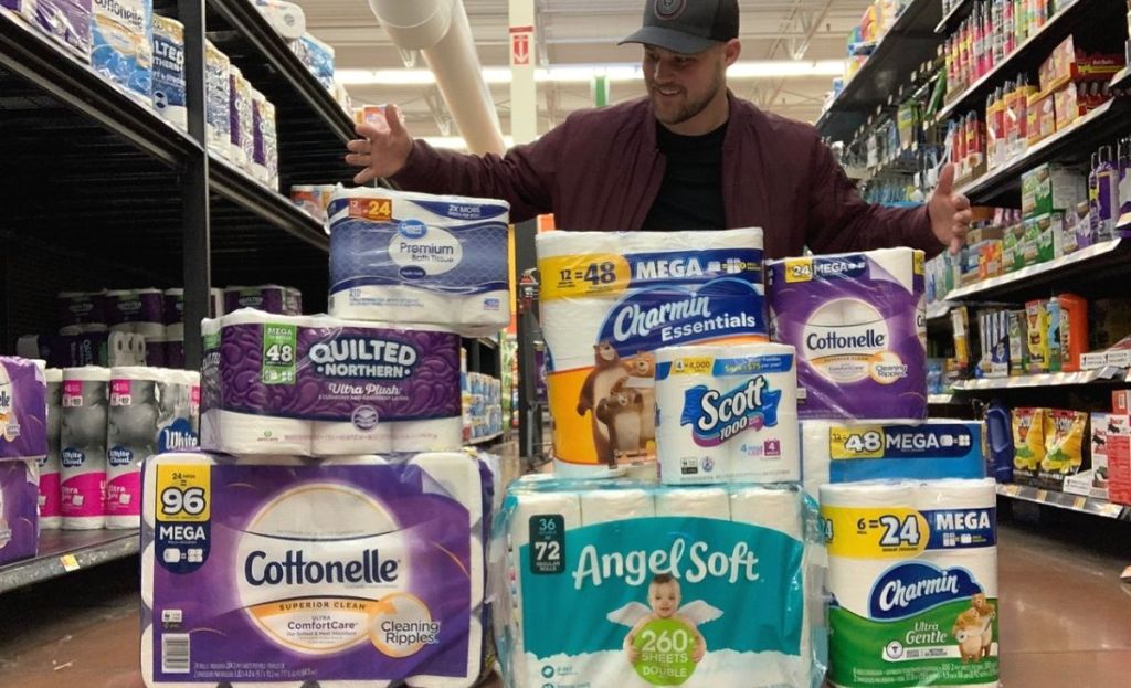 Packages of toilet paper in a Walmart aisle
