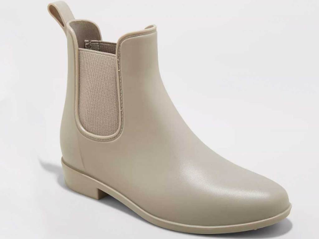 woman's beige rain boot