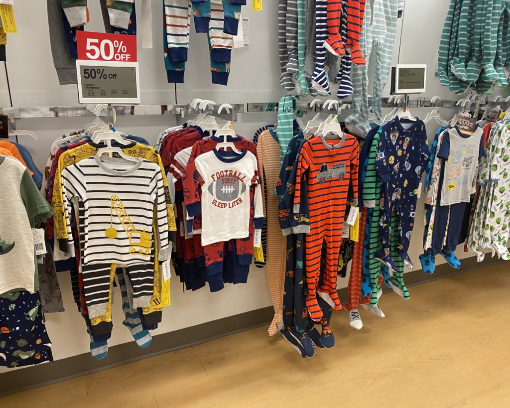 carters pajamas in store at kohls against wall