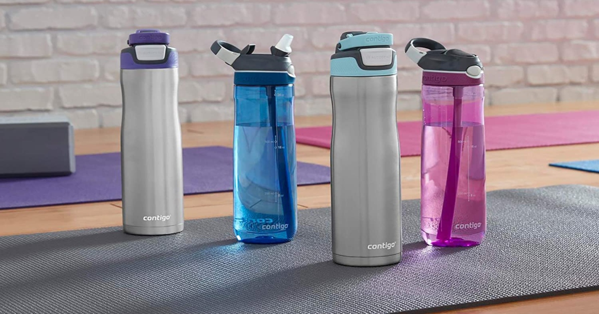 Contigo water bottles of different styles set up on a workout mat on the floor