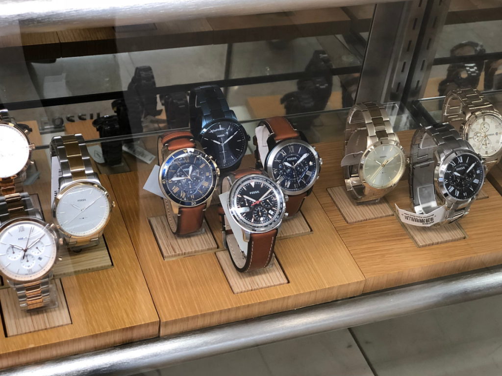 watches in display case at store