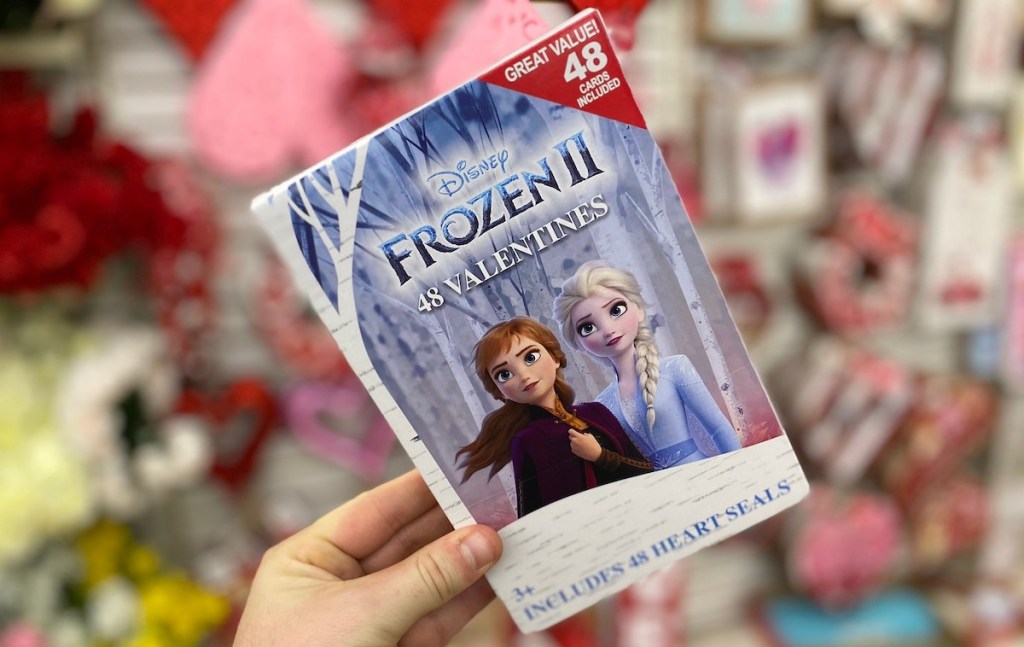 hand holding a box of frozen valentines