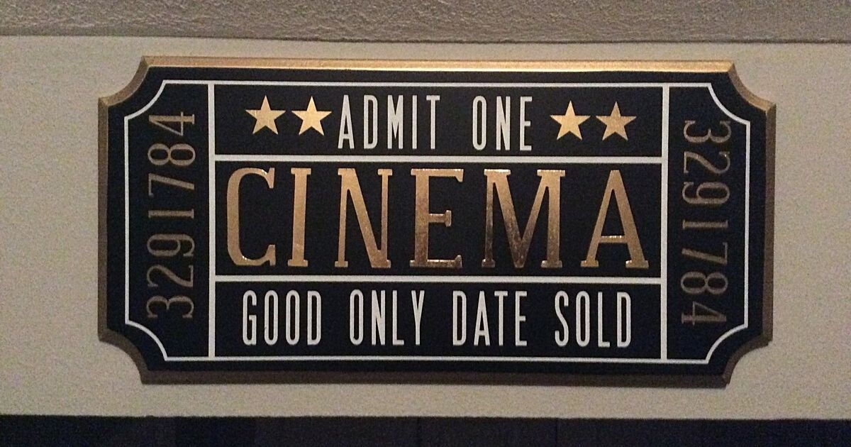 Cinema admission sign