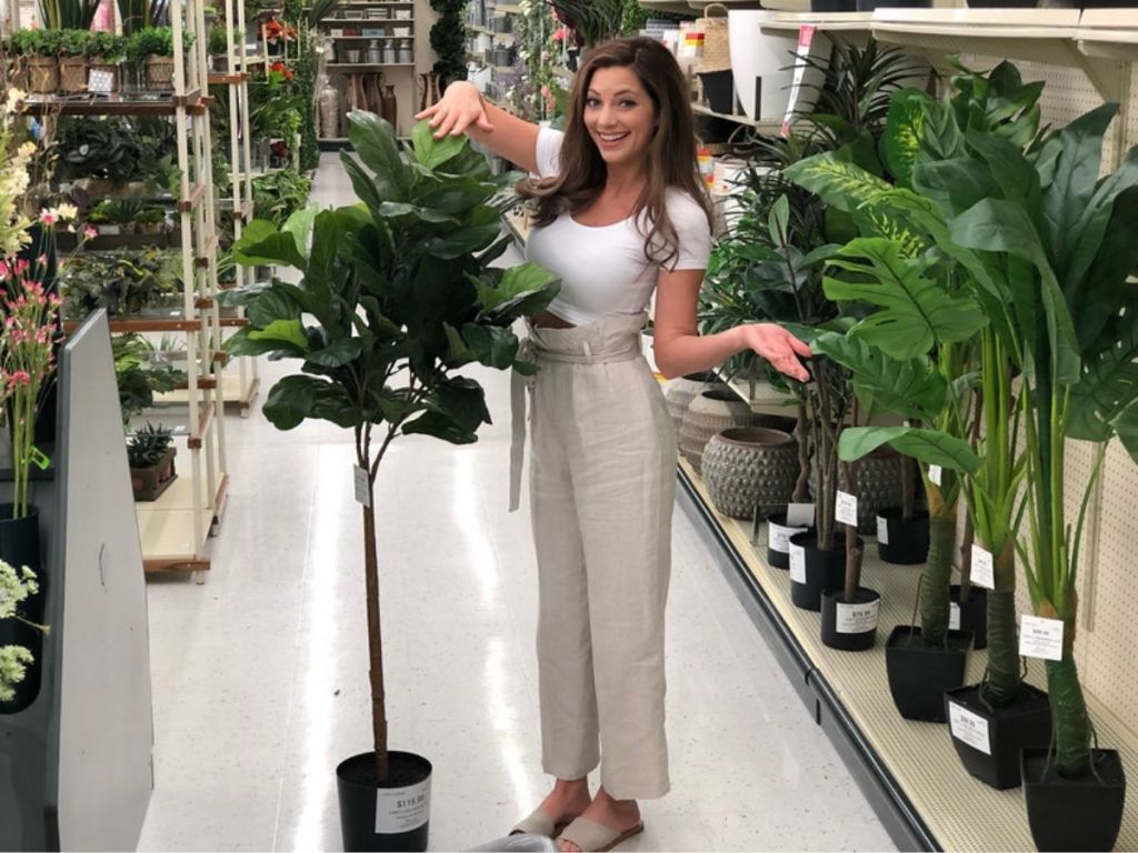 woman with hobby lobby faux plants