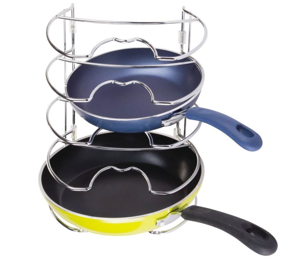 two frying pans in a silver skillet organizer