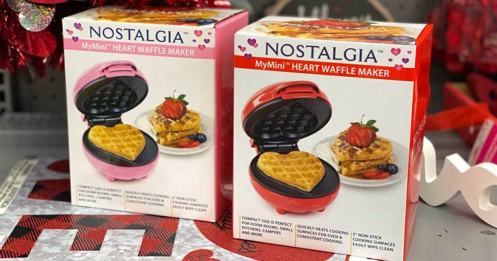 two boxes of waffle makers in the shape of hearts