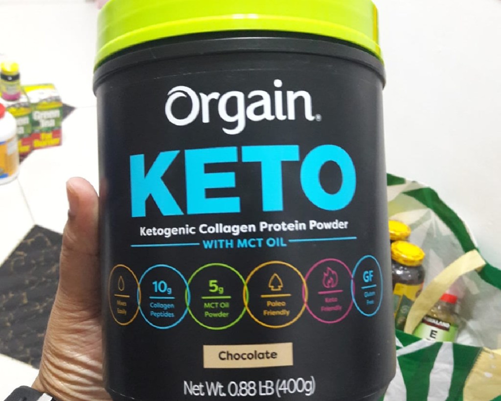 orgain keto powder in hand