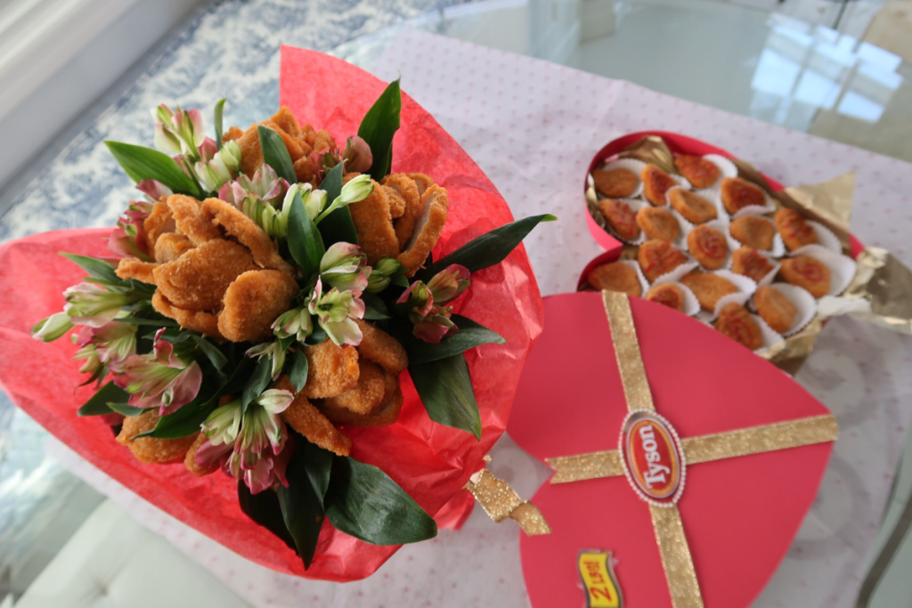 chicken nuggets in candy box and flower bouquet