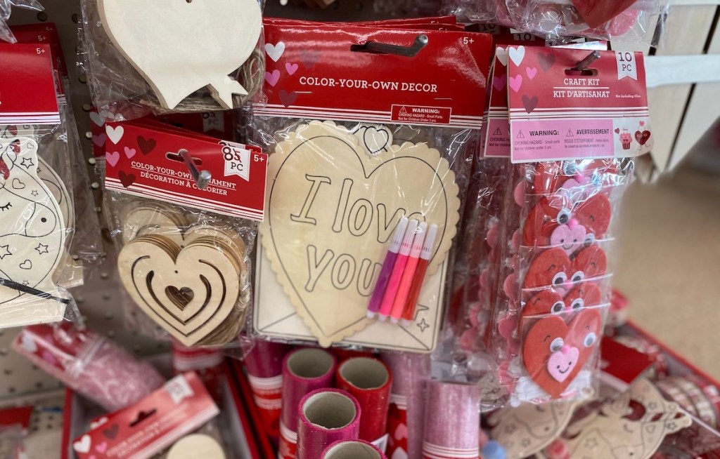i love you wood crafts hanging on store shelf