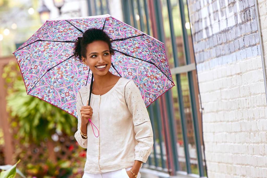 woman with opened vera bradley umbrella outside 