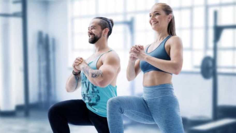 man and woman exercising