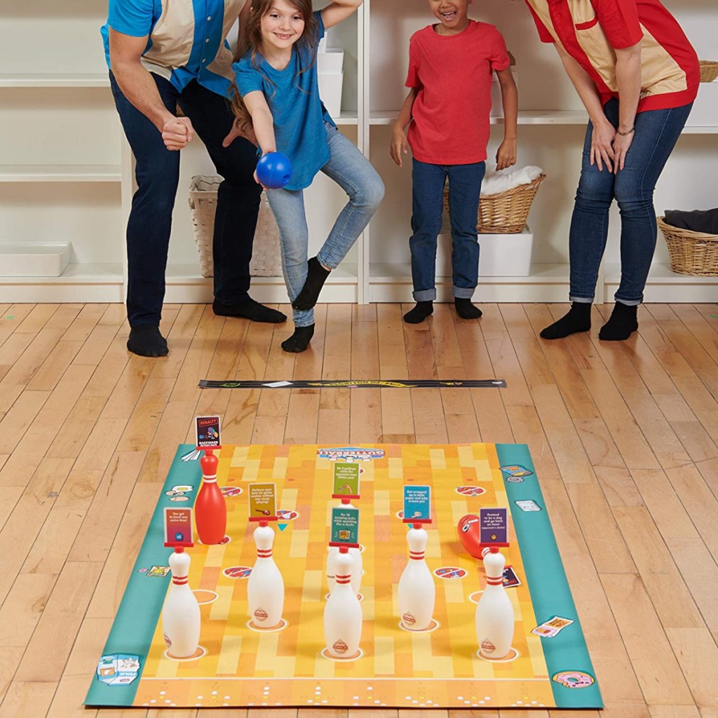 family playing a bowling themed board game!
