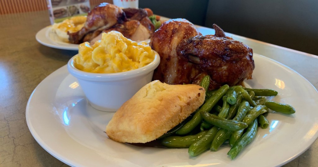 plate of green beans, roll, chicken and mac & cheese