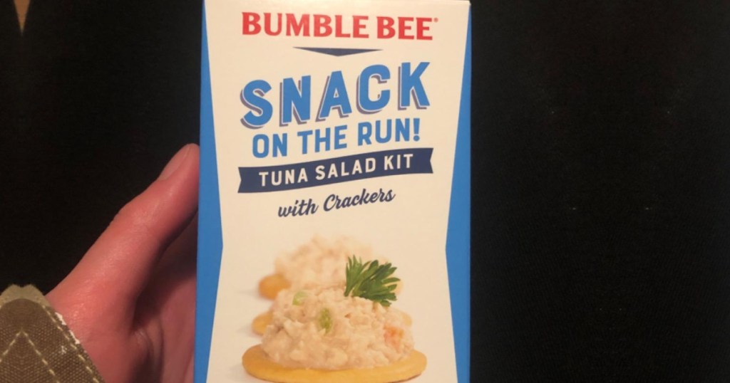 Hand holding a bumble bee tuna salad kit