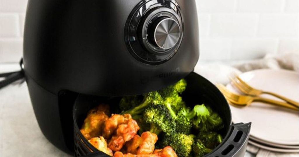 air fryer with food in it