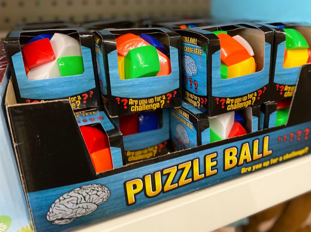 shelf of multi-color puzzle balls