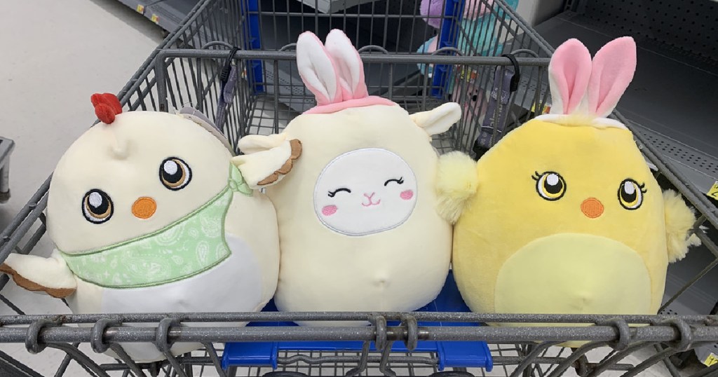 three Easter plush animals in store cart