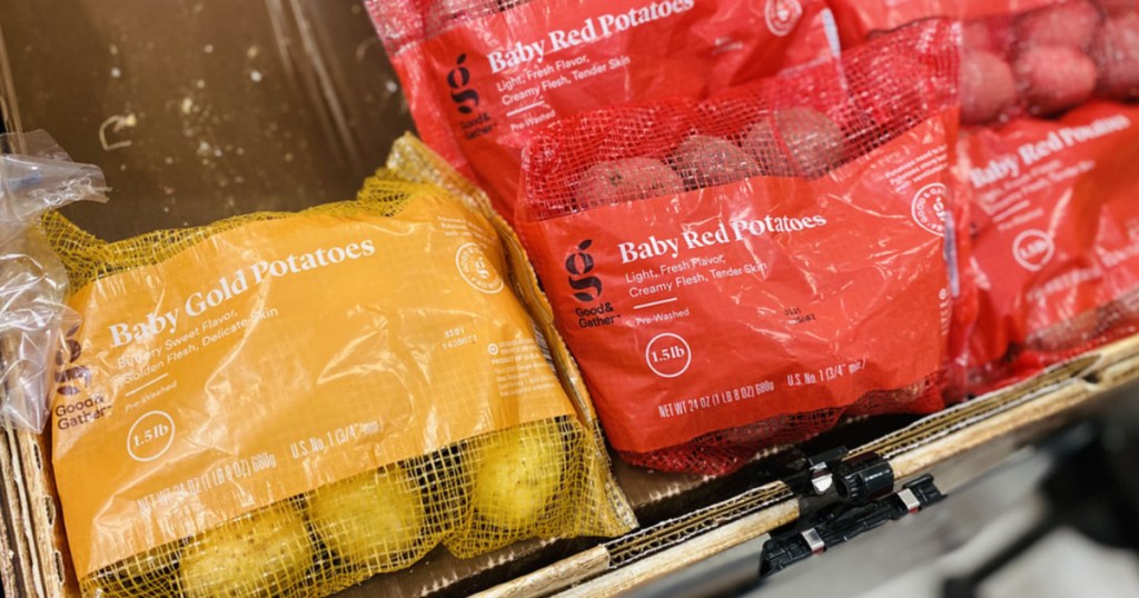 bags of baby gold and red potatoes in store