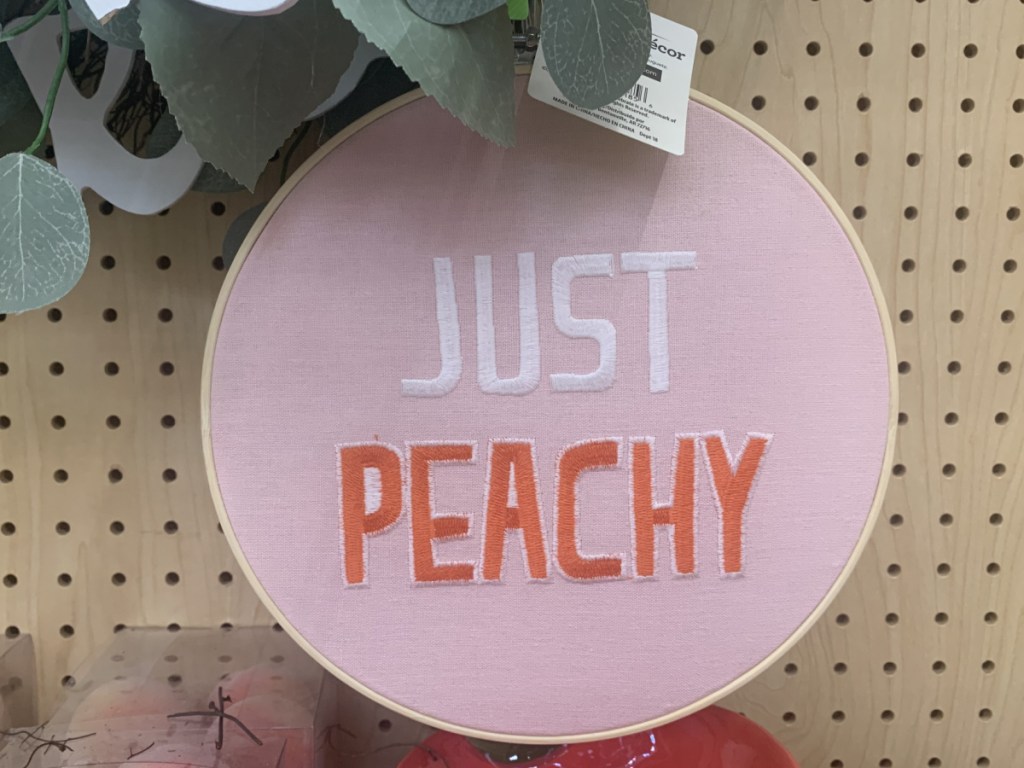 Peach themed embroidered sign