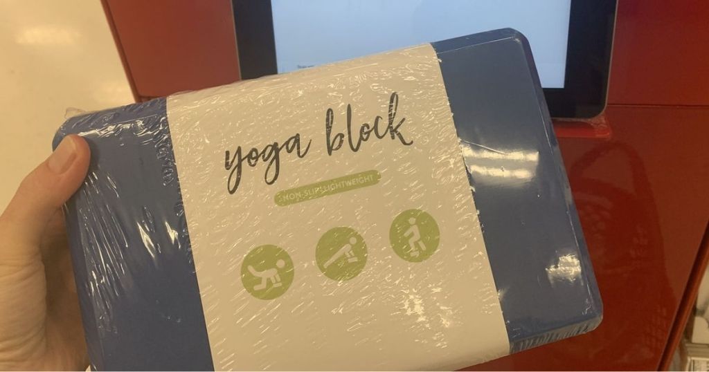 hand holding Target Vivitar Yoga Block