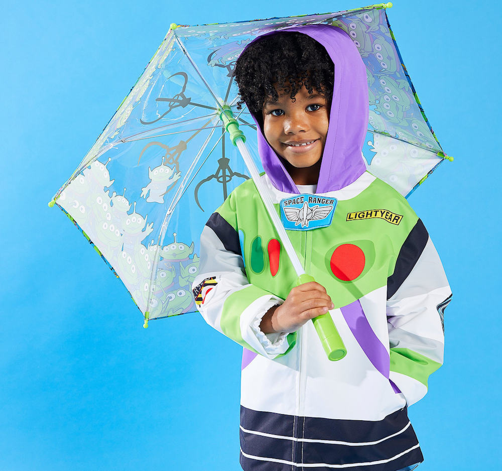 boy holding Toy Story Aliens Umbrella
