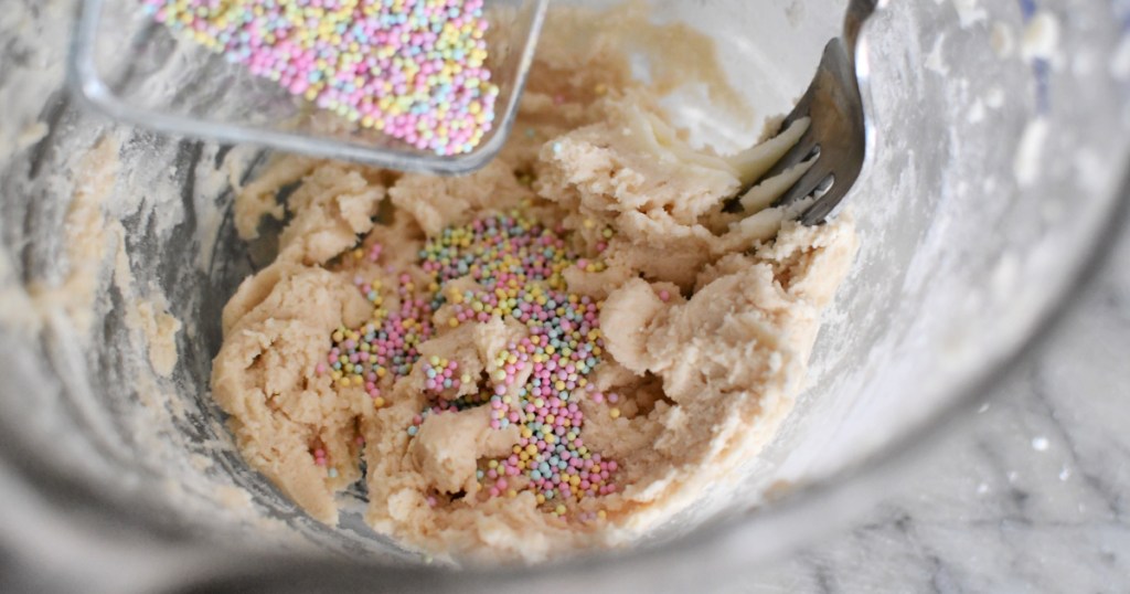 adding sprinkles to edible cookie dough