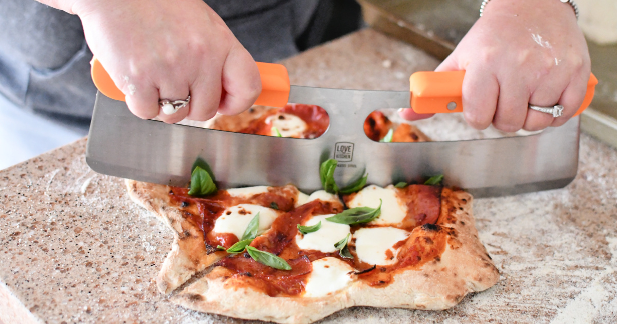 cutting pizza using an amazon pizza rocker