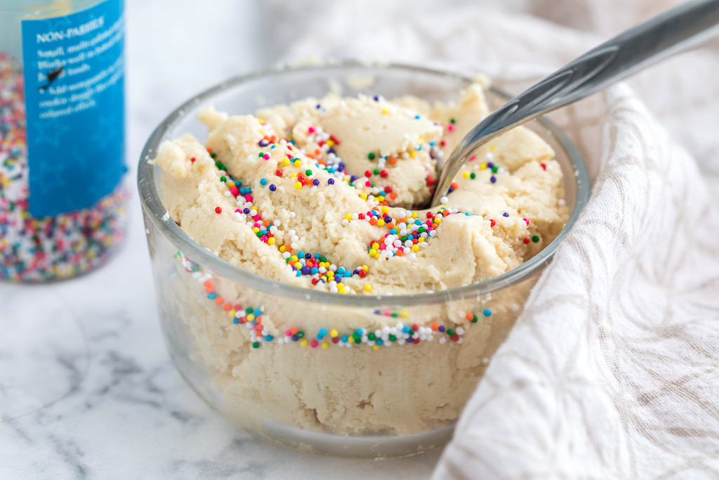 edible sugar cookie dough with sprinkles in bowl