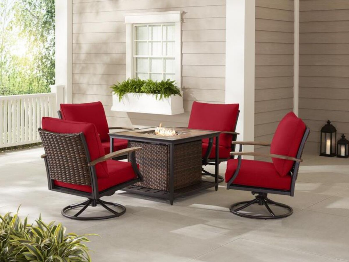 wicket fire pit patio set with red cushions