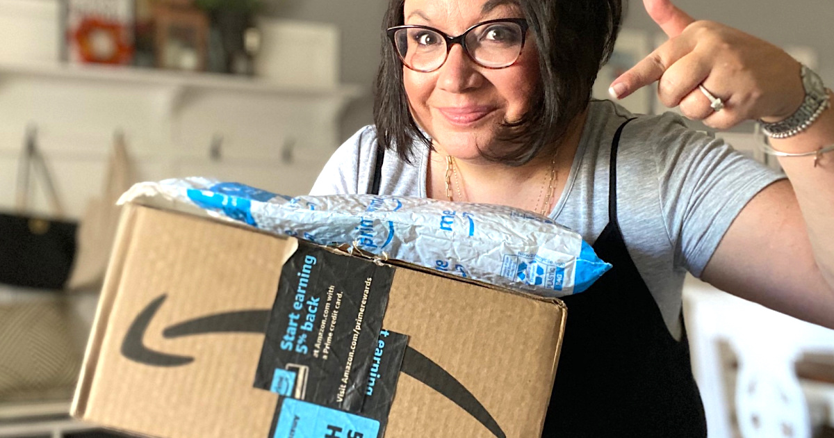 woman holding Amazon packages
