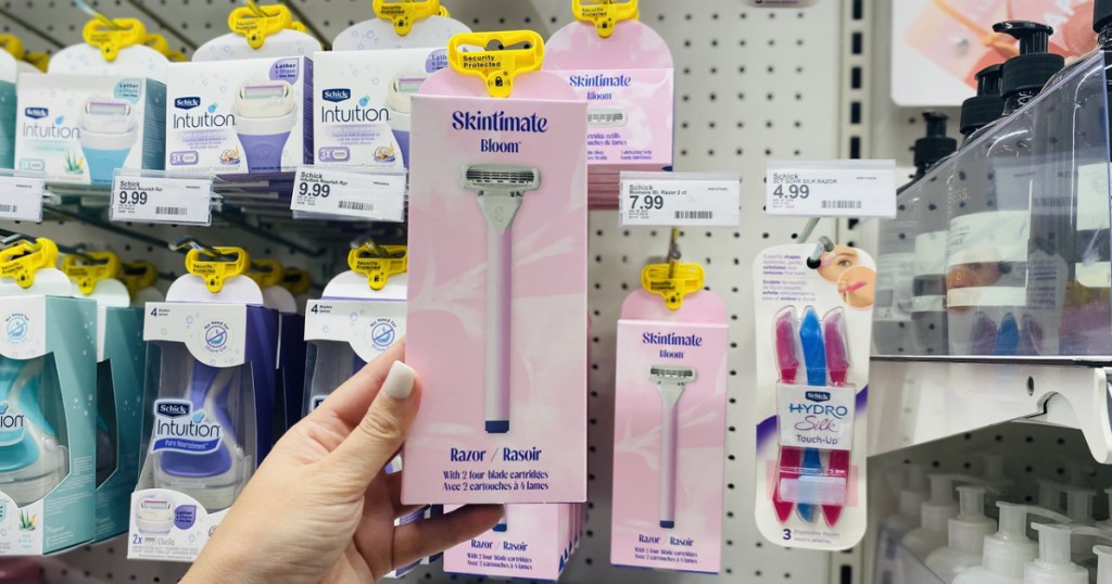 woman holding skintimate Bloom razor in a store