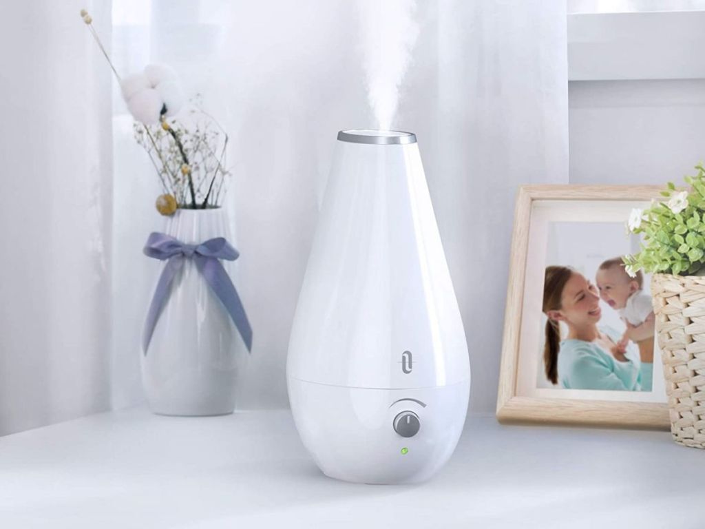 white humidifier on side table