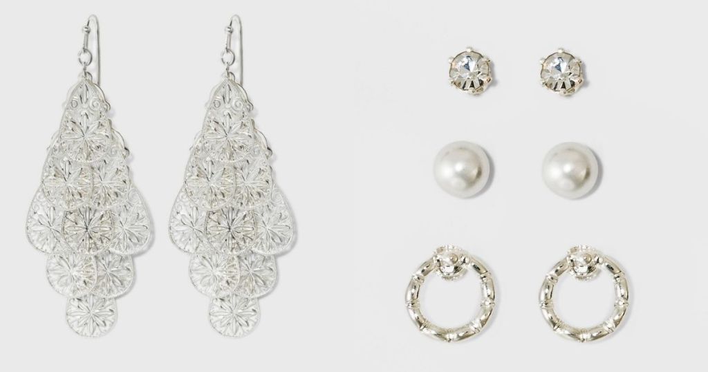 two sets of silver earrings